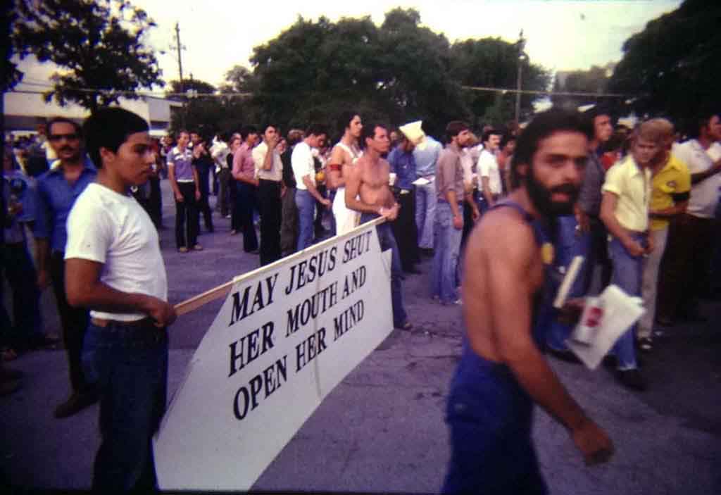 A color photo from 1977 of a crowd of people protesting Anita Bryant.